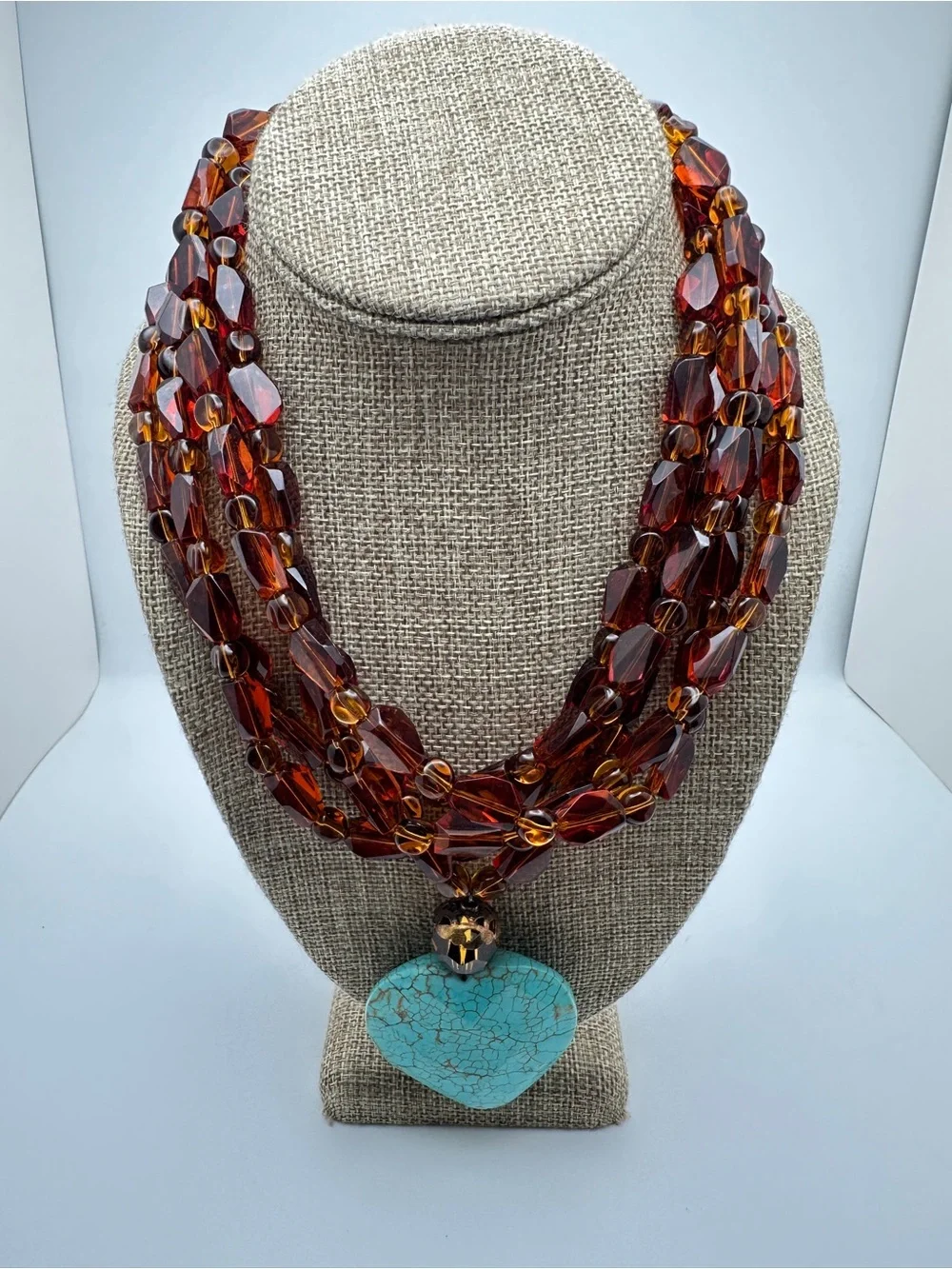 Multi-Strand Amber Glass Necklace with Turquoise Heart Pendant